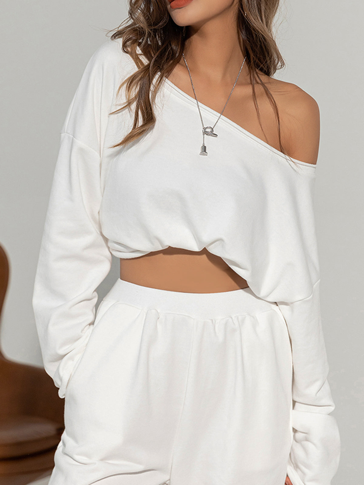 LUNA - symmetrical Off Shoulder Solid Sweatshirt